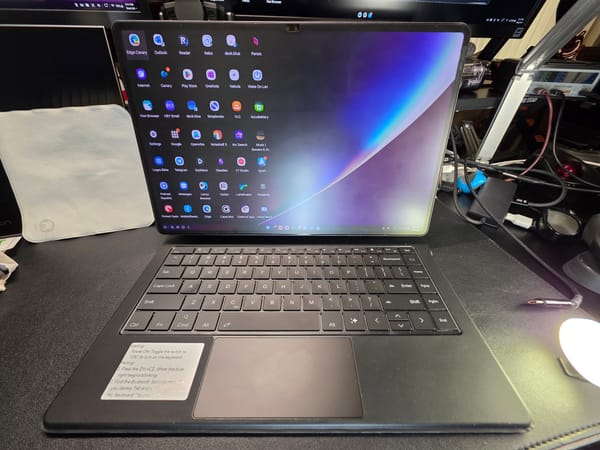 The magnetic suspension keyboard is pictured on my black desk with my Tab S9 Ultra attached